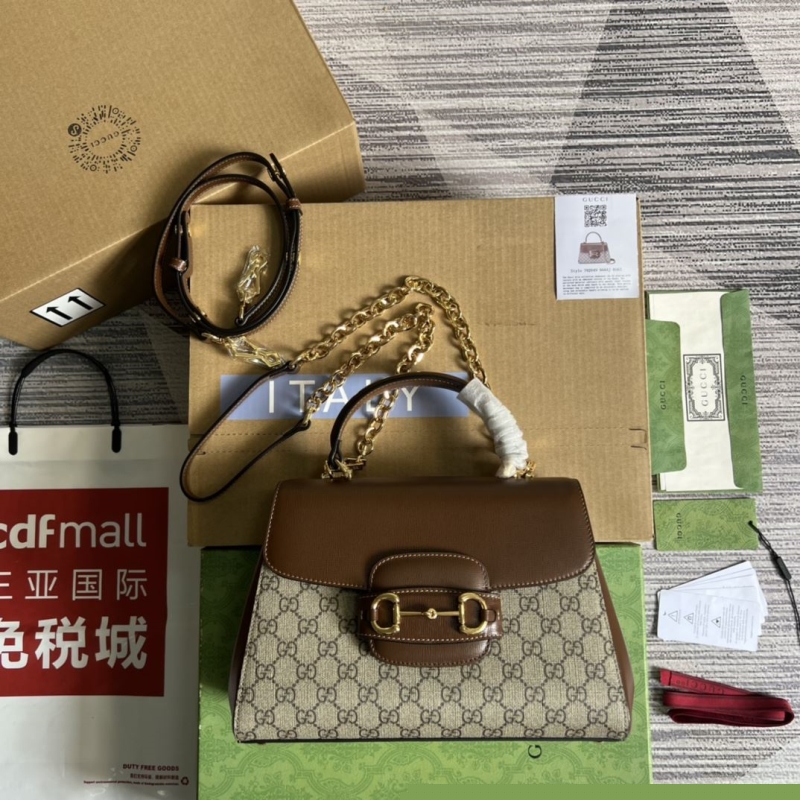 G*u*i top handle bags